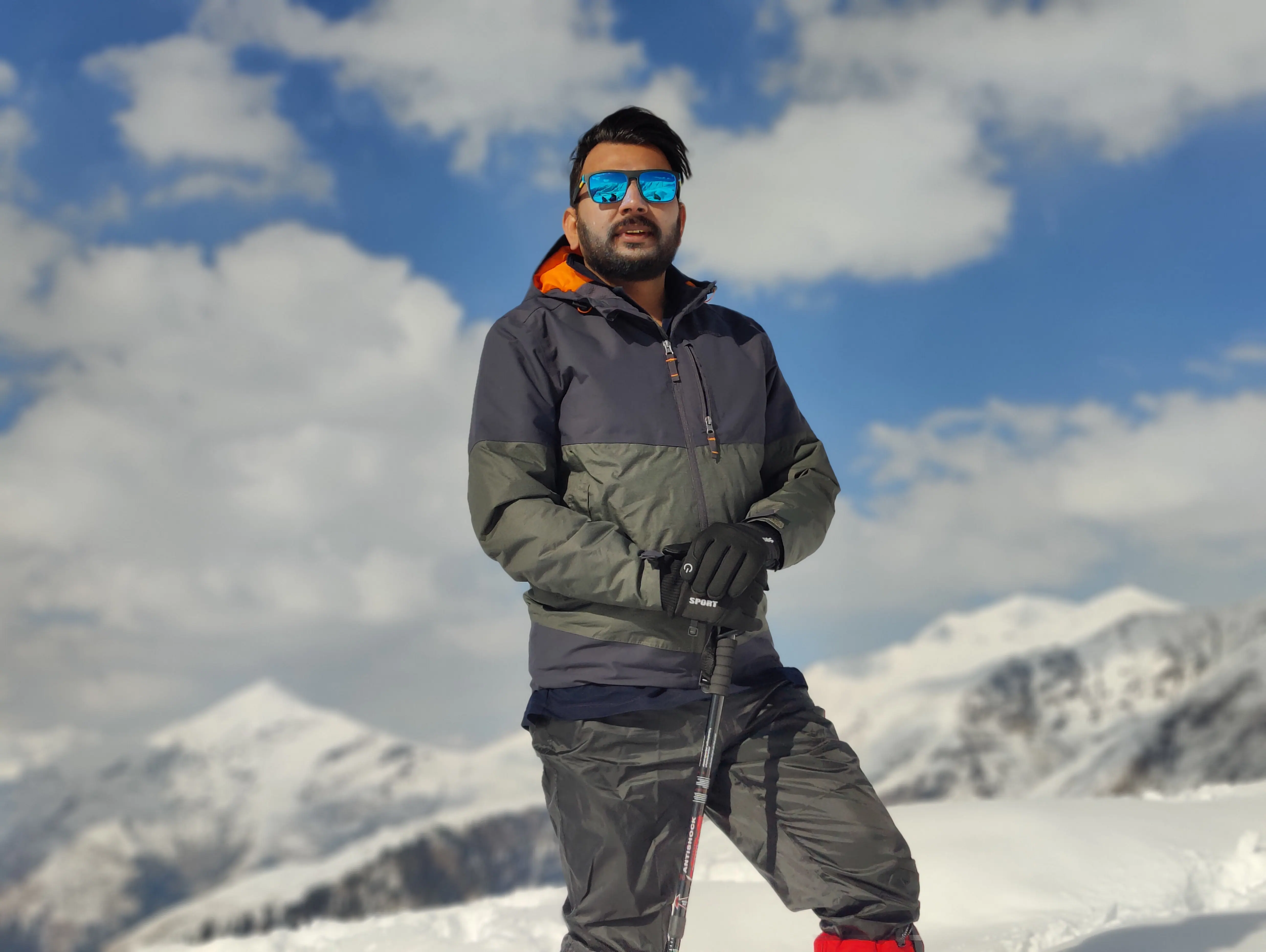 M Farhan Saqib in mountain clothing against snowy peaks